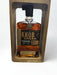 A bottle of Knob Creek 21 Years bourbon whiskey from Campbell Wines, with dark amber liquid and classic label.